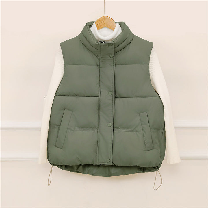 Sporty quilted vest for women with high collar and practical pockets Lune London