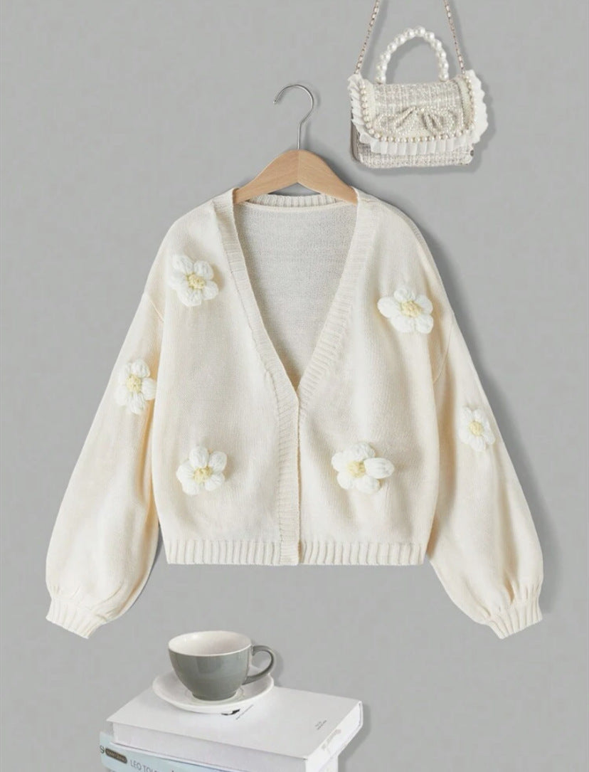 Short jacket for women with playful flower appliqués Lune London