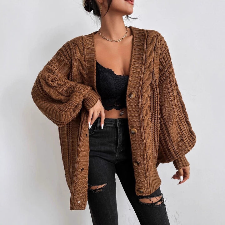 Oversized knitted cardigan for women with an elegant cable pattern and practical buttons Lune London