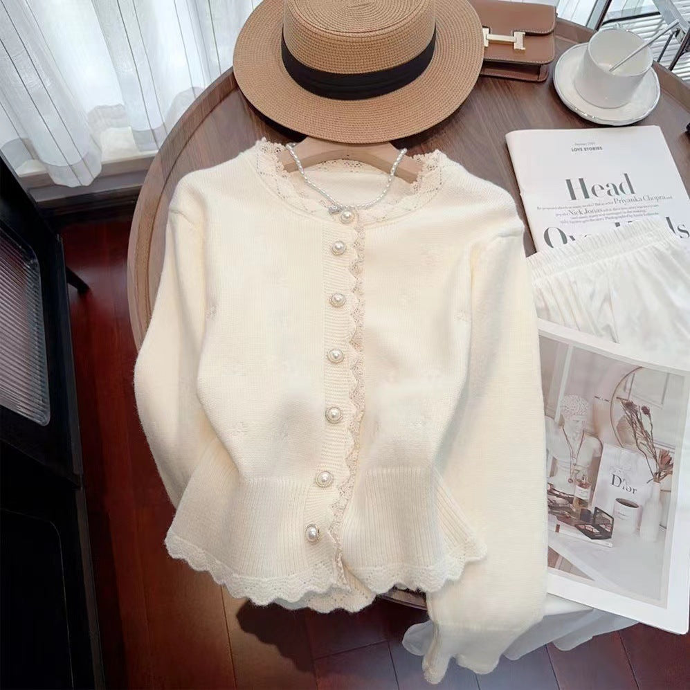 Knitted jacket for women with decorative pearl buttons and a delicate ribbed structure Lune London