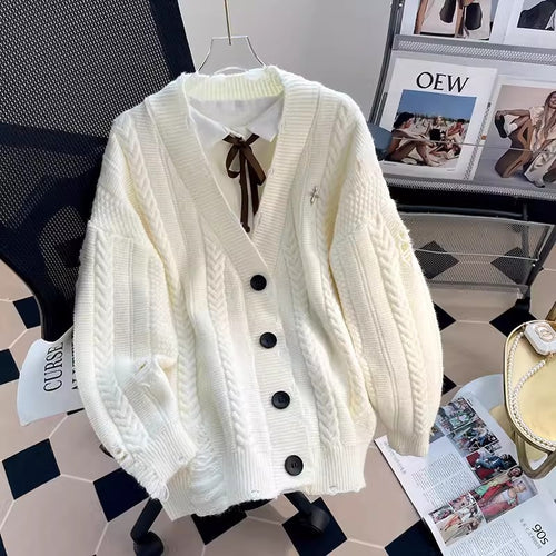 Ladies chunky knit cardigan with deep V-neckline and button details Lune London