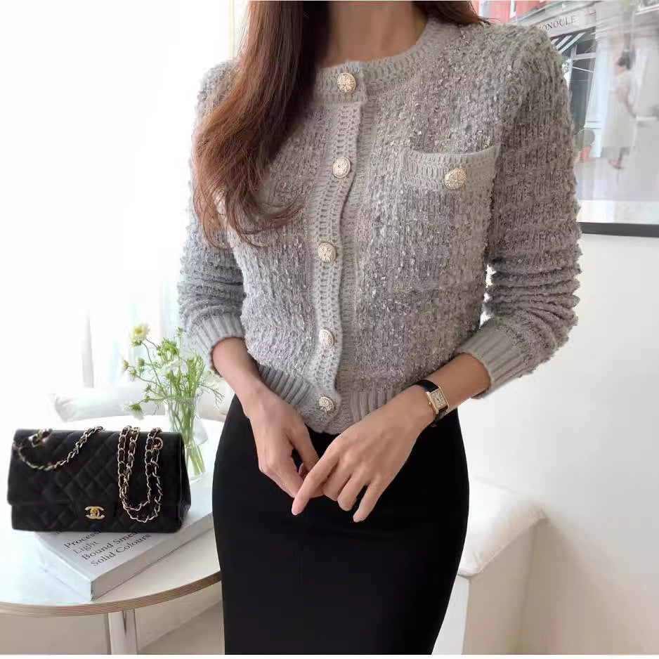 Short women's vest with decorative button details and structured design Lune London