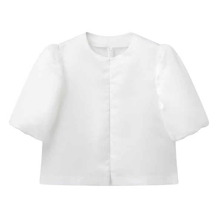 Veste élégante pour femmes avec des manches bouffantes et une coupe courte Chic & Stil