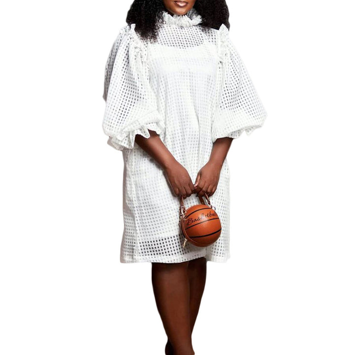 Transparent dress for women with voluminous puff sleeves and a chic check pattern.