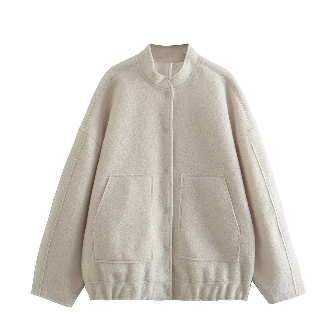 Ladies oversized fluffy coat with practical pockets and an elegant high collar Lune London