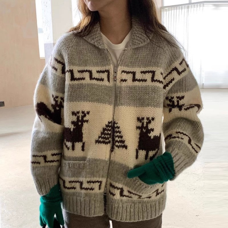 Women's cardigan with festive reindeer pattern and practical pockets Lune London