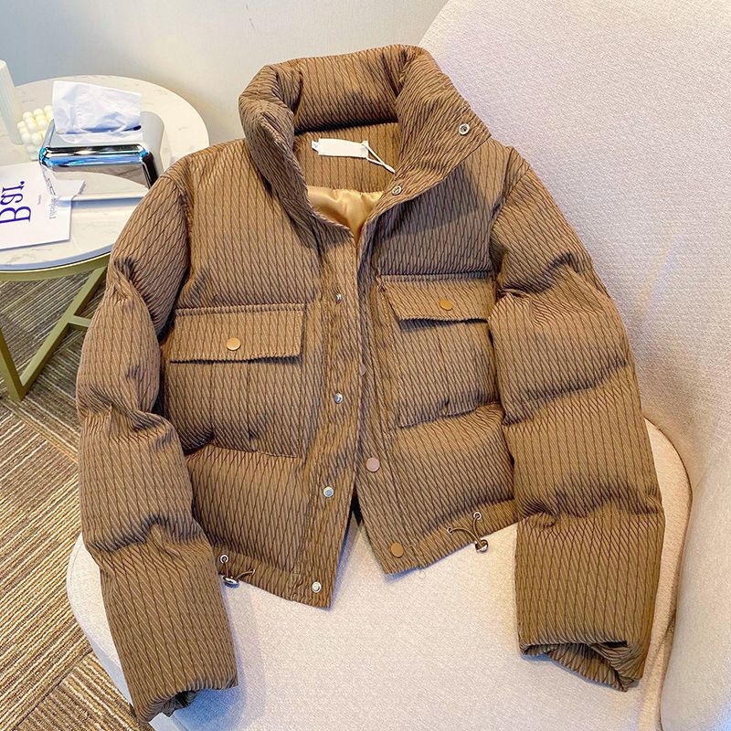 Ladies fashionable down jacket with structured design and practical pockets Lune London