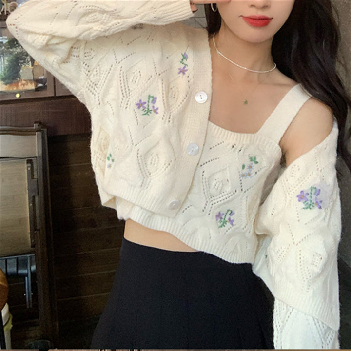 Ladies short knit vest with floral accents and openwork pattern Lune London
