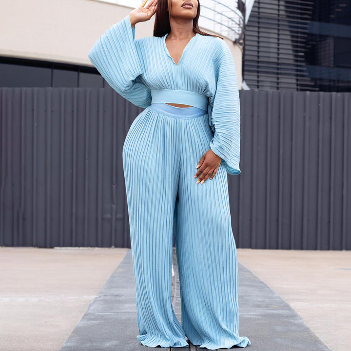 Puffed sleeve pleated jumpsuit for women with a fitted silhouette Lune London