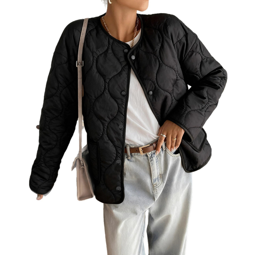 Veste matelassée pour femmes au design moderne et aux poches pratiques Chic & Stil