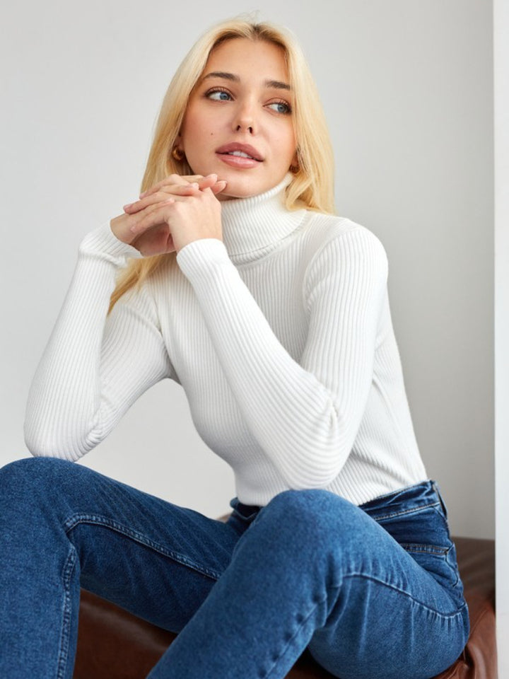Pull long femme avec col haut et texture en fine côtes Chic & Stil