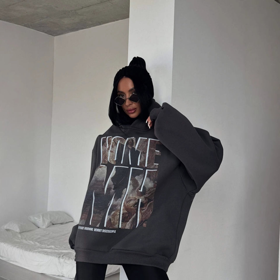 Dames sweat à capuche oversize avec impression graphique accrocheuse Chic & Stil