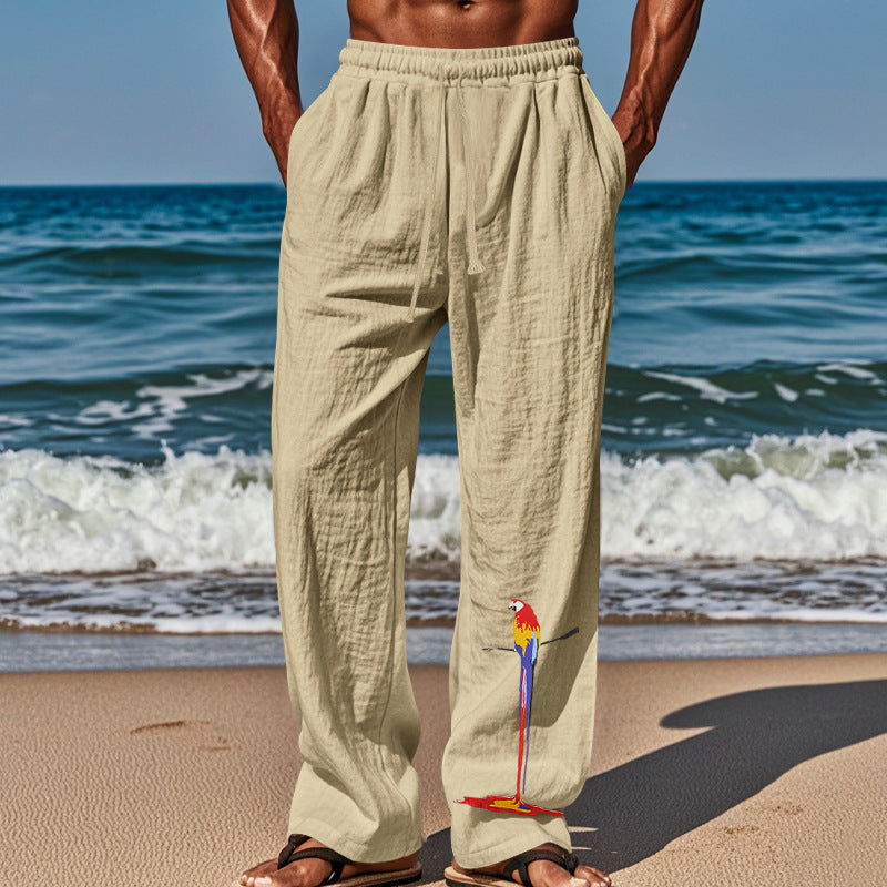 Casual beach pants for men with elastic waistband and colorful bird pattern Lune London
