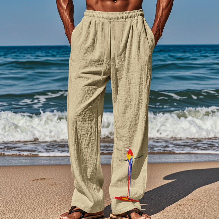 Casual beach pants for men with elastic waistband and colorful bird pattern Lune London