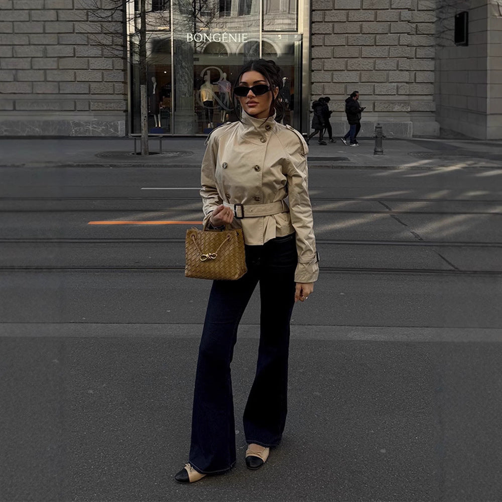 Women's trench coat with a belted waist and decorative button details Lune London