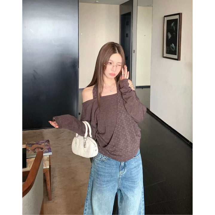 Women's long sleeve top with asymmetric cut and decorative details Chic & Stil