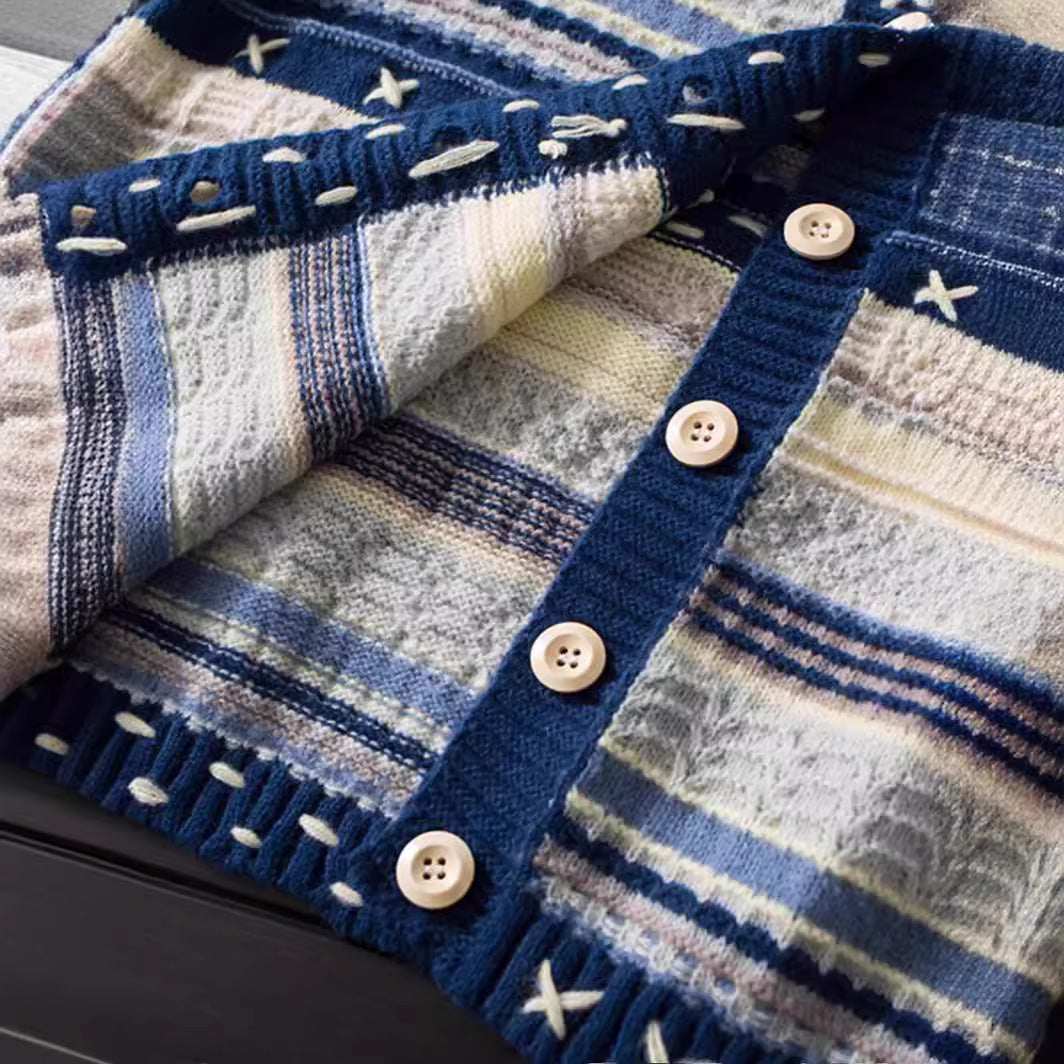 Ladies knitted patterned vest with decorative buttons and deep pockets Lune London