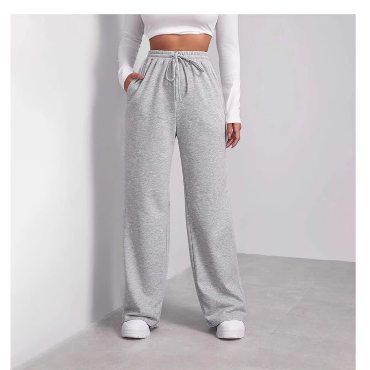 Women's comfortable casual pants with elastic waistband and practical side pockets Chic & Stil