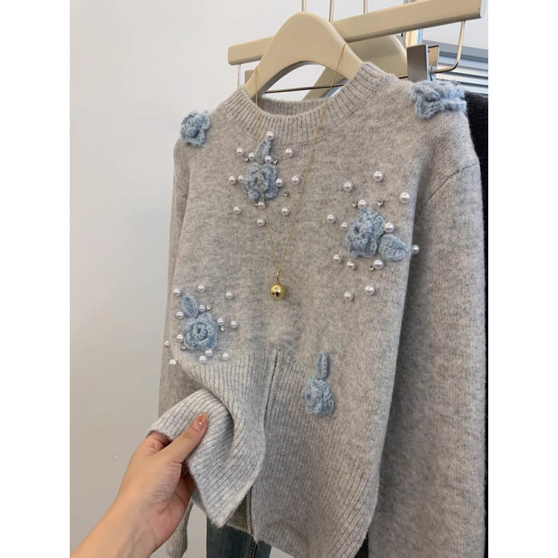 Sweater stylé pour femmes avec des applications florales Chic & Stil