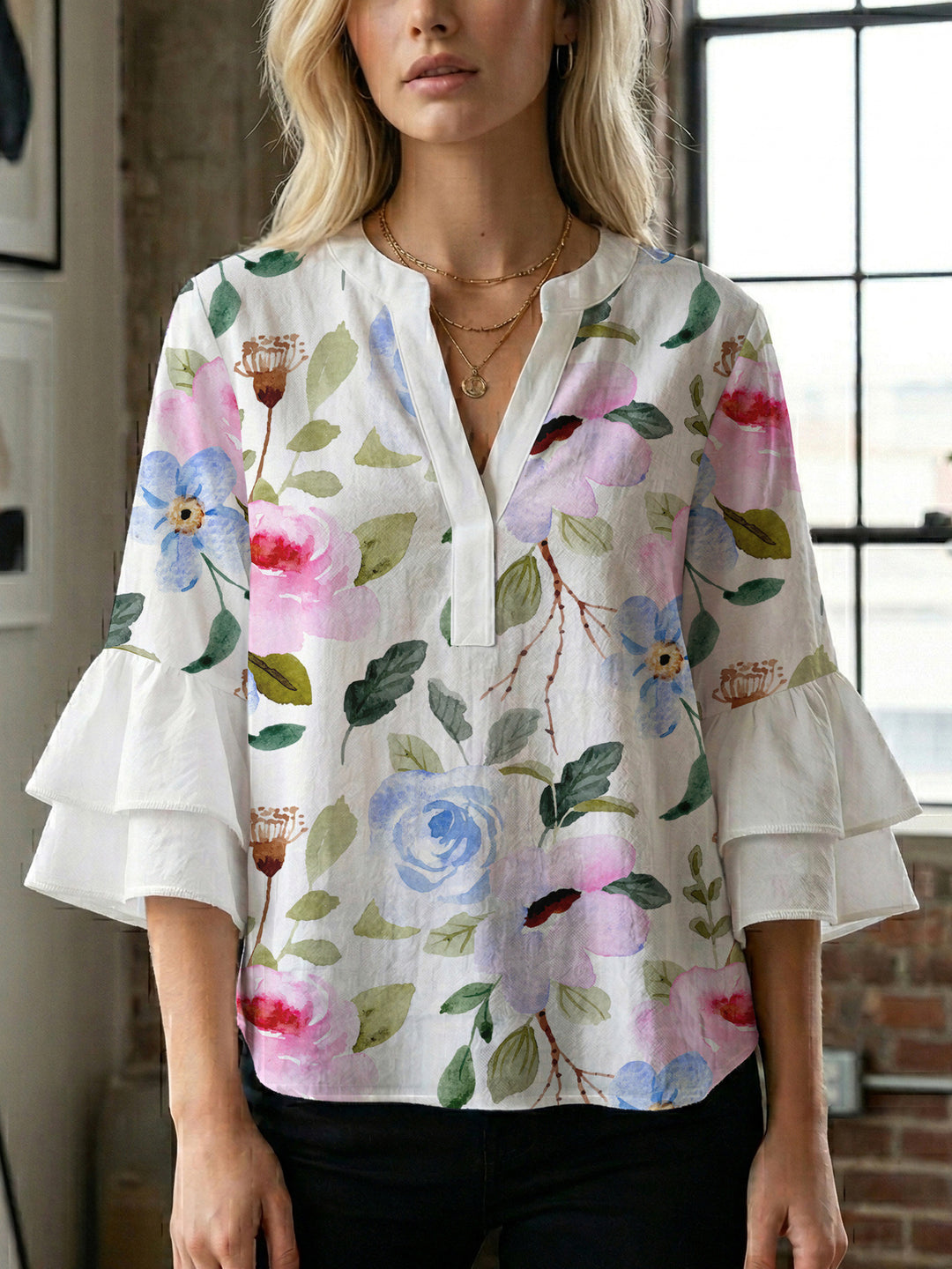 Women's blouse with ruffle details and eye-catching animal print Lune London