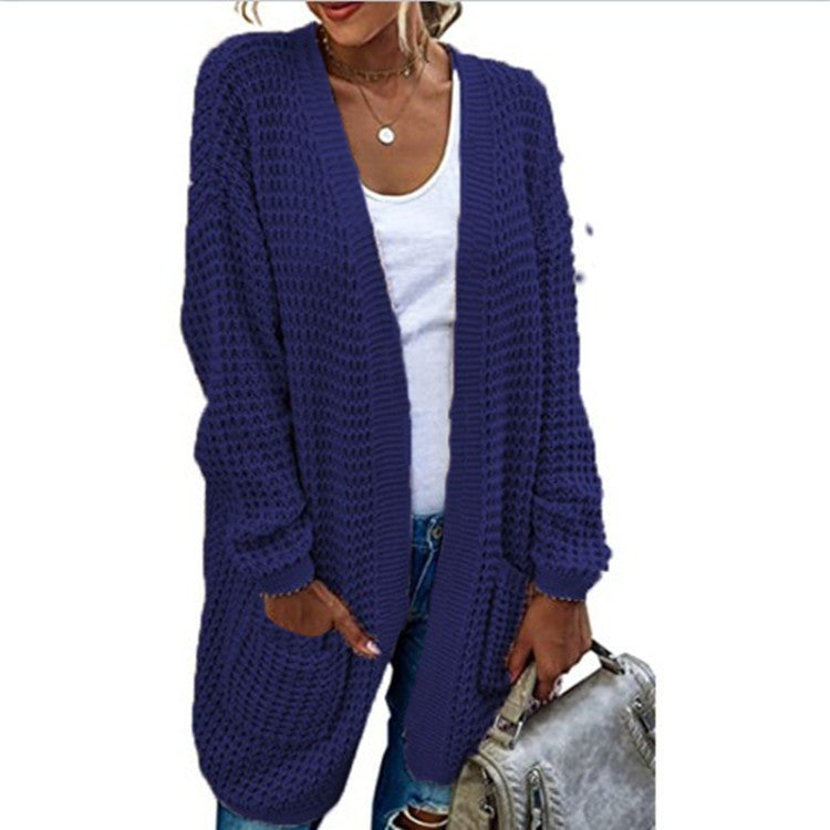 Chunky knit women’s cardigan with a relaxed fit and practical pockets Lune London