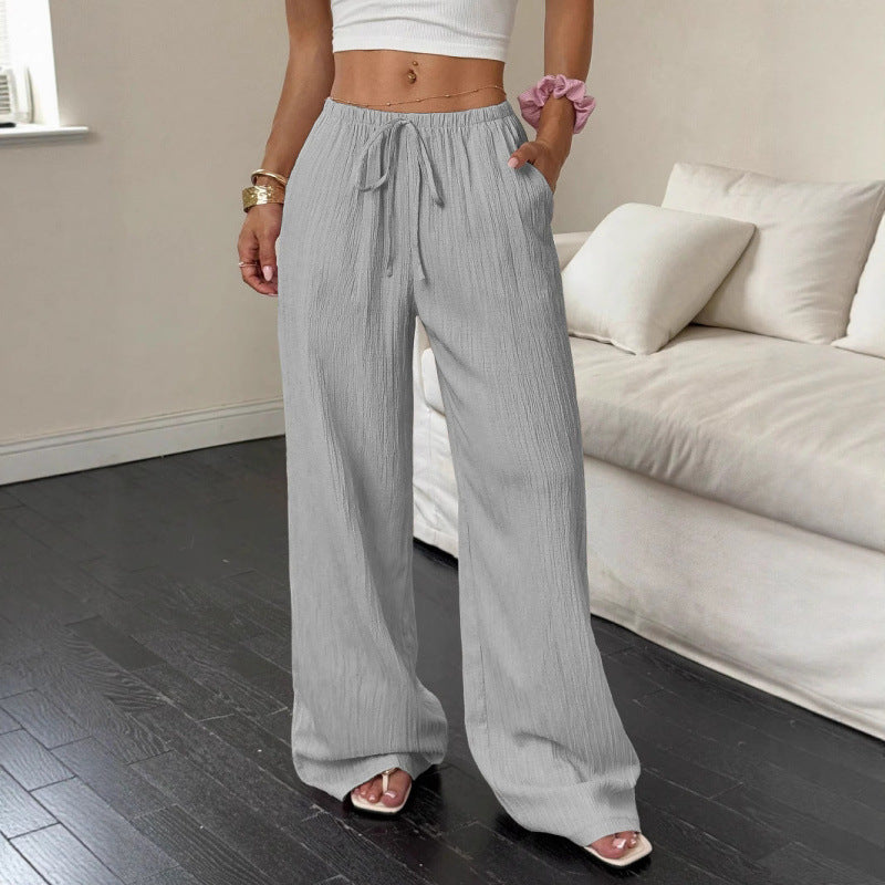 Casual and wide trousers for women with elastic waist and tie belt Lune London