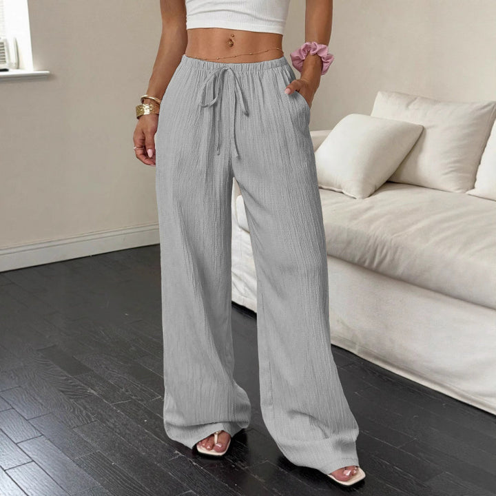 Casual and wide trousers for women with elastic waist and tie belt Lune London