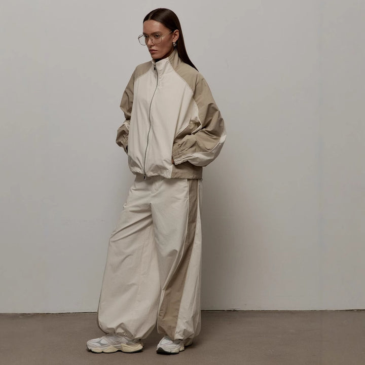 Women's Modern Sports Jacket with High Collar and Contrasting Sleeve Panels