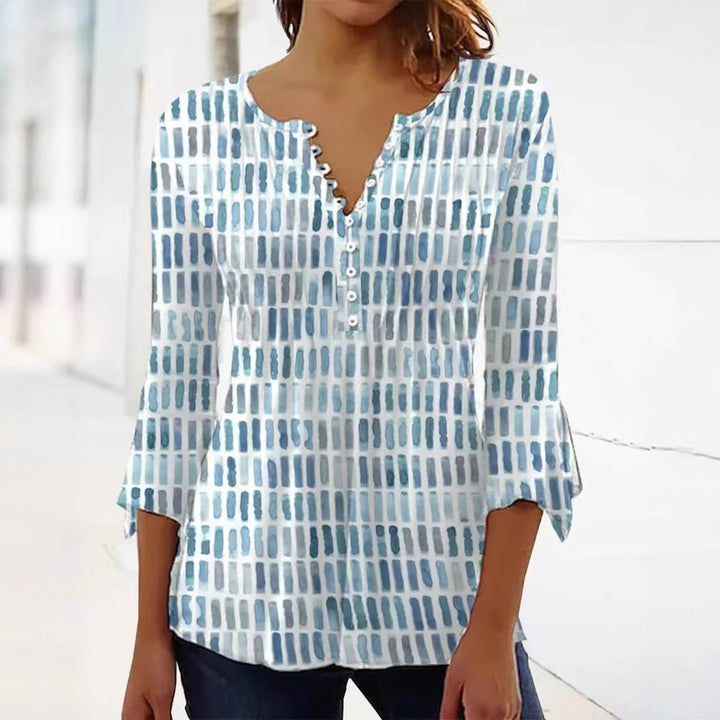 Blouse pour femmes au design graphique moderne avec détails de boutons Chic & Stil