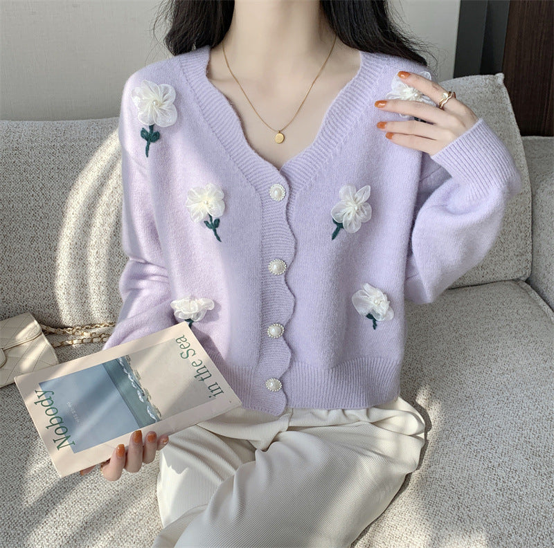 Playful women's cardigan button with floral embroidery and pearl buttons Lune London