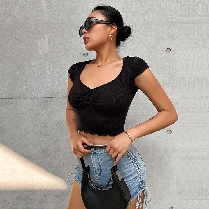 Short top for women with elastic gathers and trendy V-neck Chic & Stil