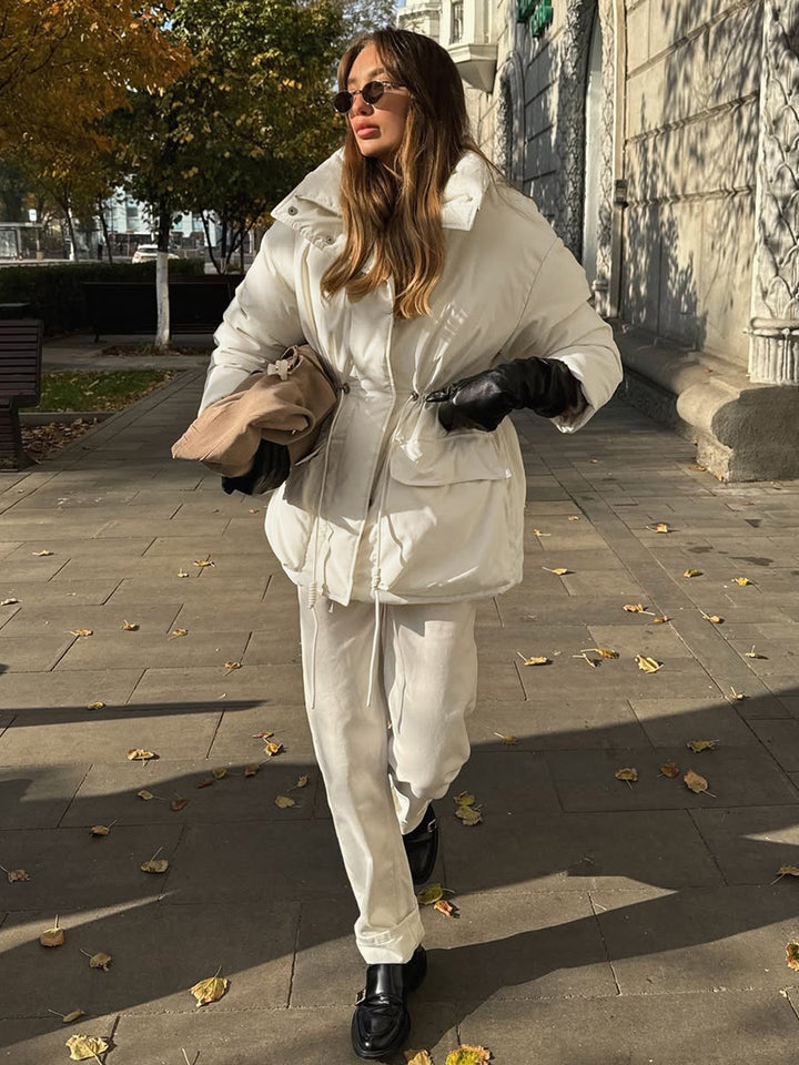 Quilted winter jacket for women with high collar and practical drawstring waist Lune London