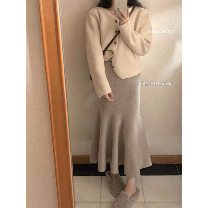 Jupe midi élégante pour femme avec ourlet flottant et taille haute Chic & Stil