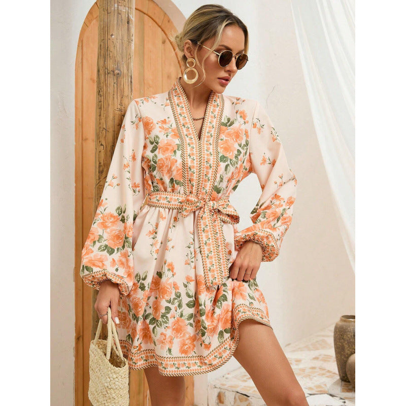 Women's dress with floral details and waist belt Lune London