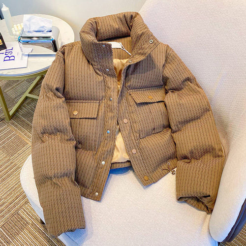 Ladies fashionable down jacket with structured design and practical pockets Lune London
