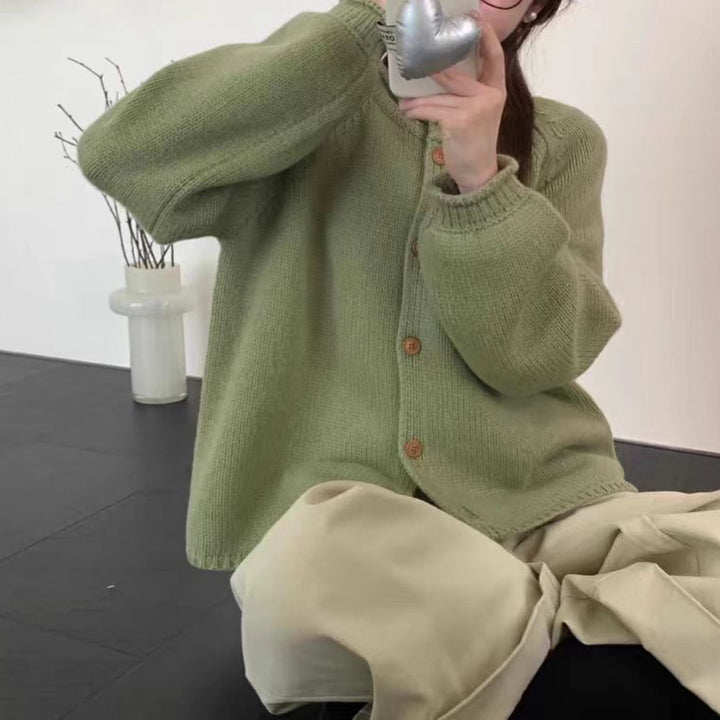 Knitted jacket for women with asymmetrical cut and generous balloon sleeves Lune London