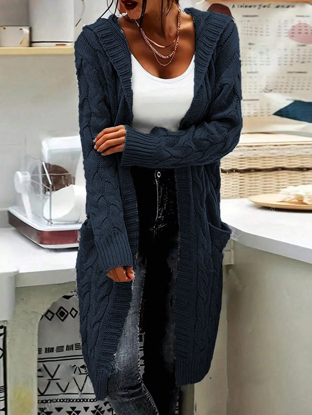 Chunky knit cardigan for women with practical pockets and elegant twisted details Lune London