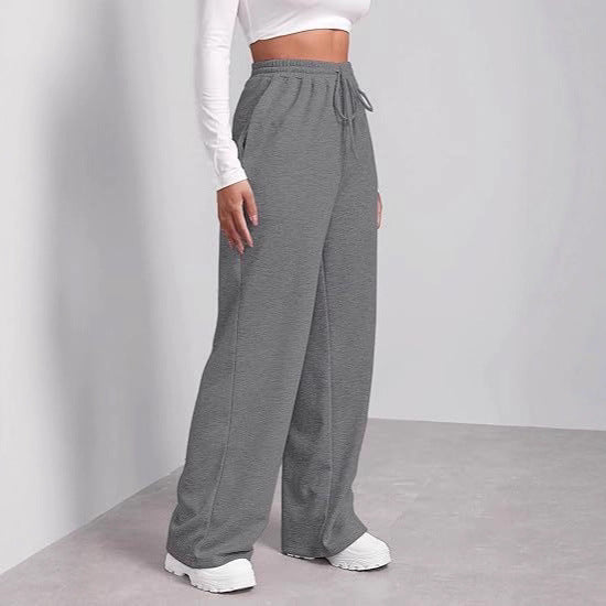 Women's wide Relaxed Fit leisure pants with elastic waistband and practical pockets Chic & Stil