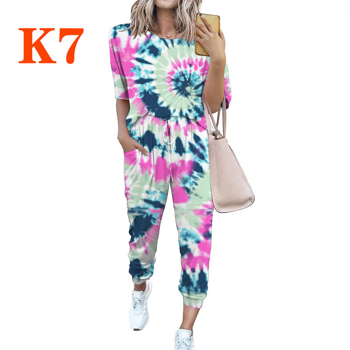Ladies lightweight casual jumpsuit with a striking tie-dye pattern and practical pockets Lune London