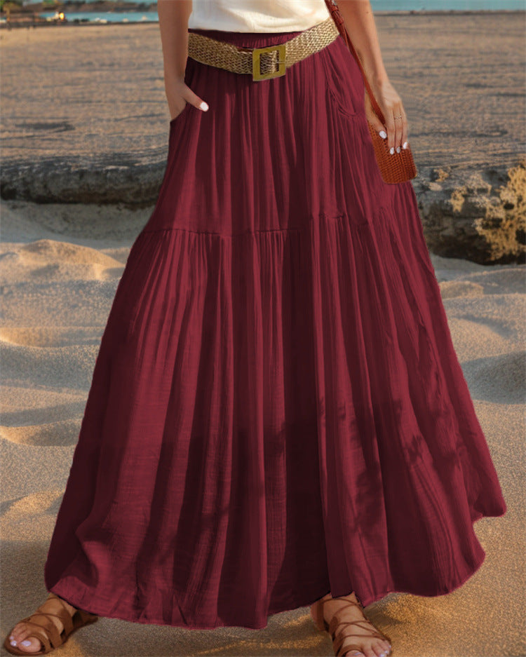 Maxi flared skirt for women with elegant pleated draping and practical pockets Lune London