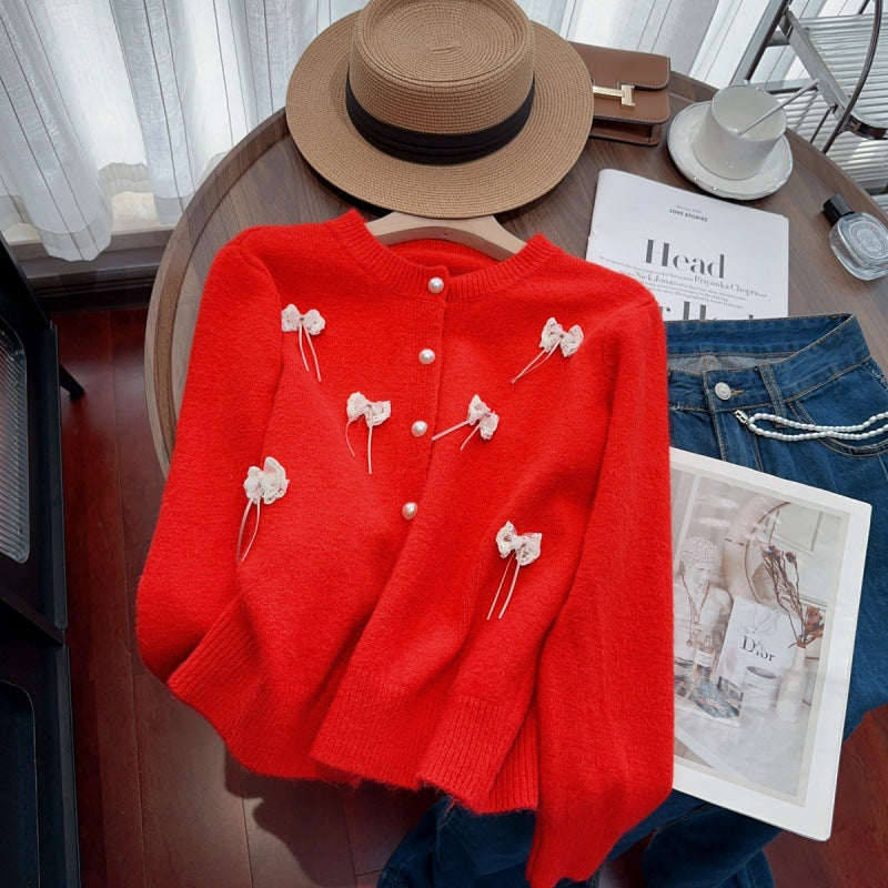 Knit jacket for women with feminine appliques and chic button details