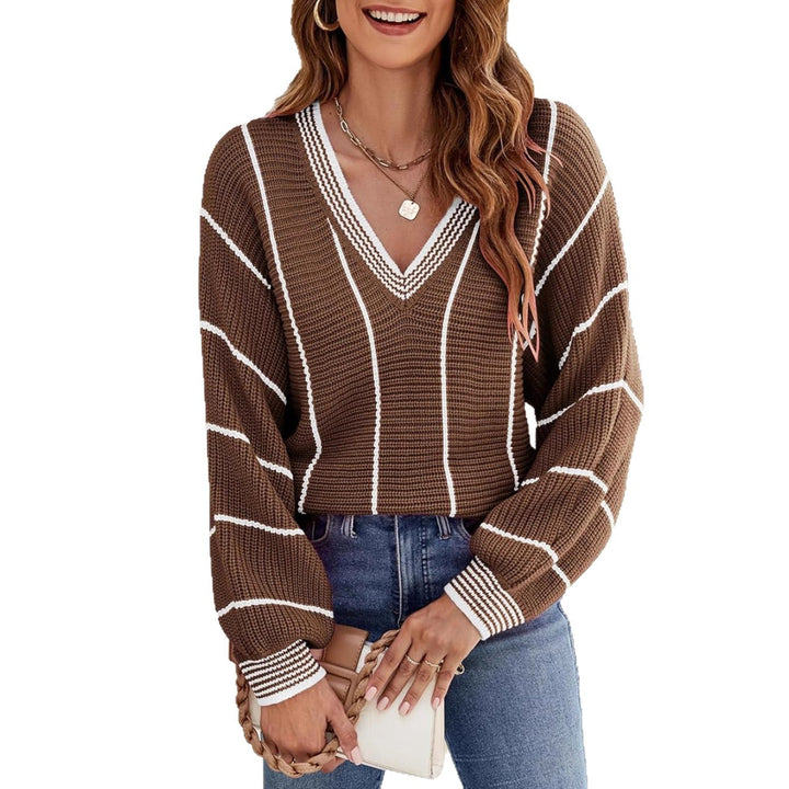 Pull élégant pour femmes avec col en V et design rayé Chic & Stil