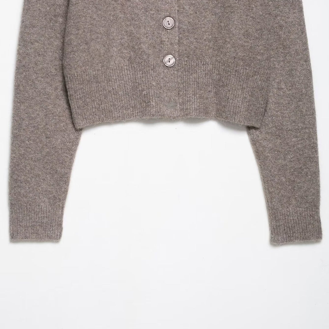 Short knitted jacket for women with fine buttons and an elegant cut Lune London