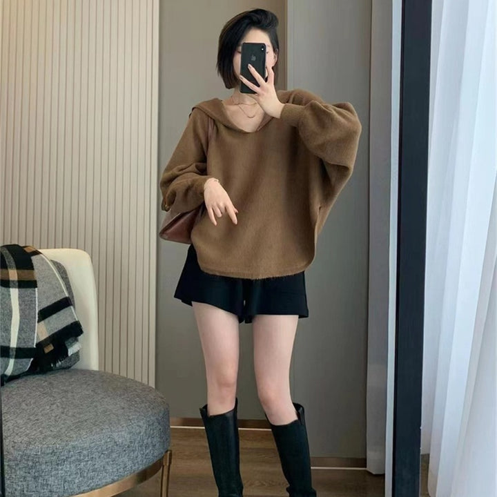 Hoodie féminin à la mode avec des manches volumineuses et une coupe élégante Chic & Stil
