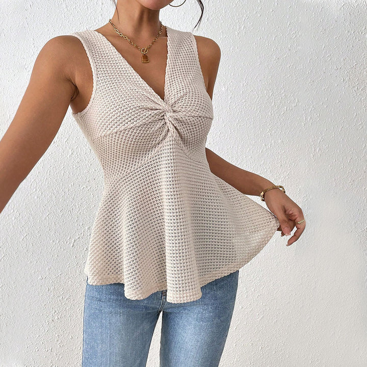 Top sans manches élégant pour femmes avec coupe fluide et nœud décoratif Chic & Stil