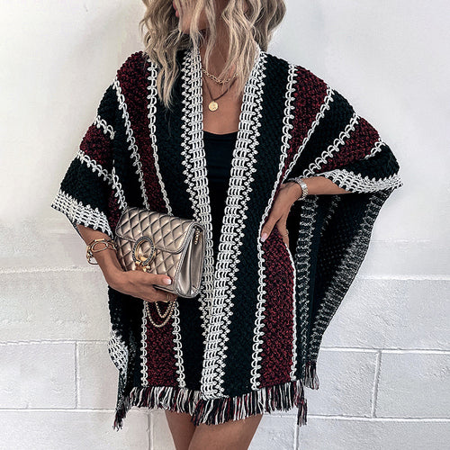 Knit poncho for women with V-neck and fringes Lune London