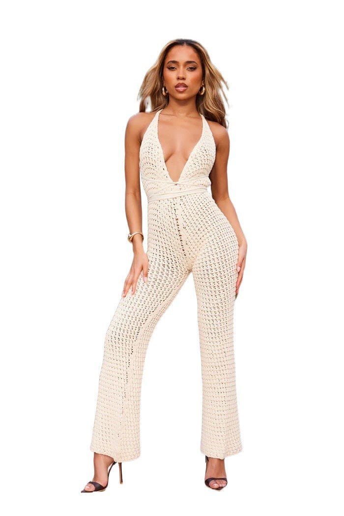 Women's knit jumpsuit with deep V-neck and tailored waist