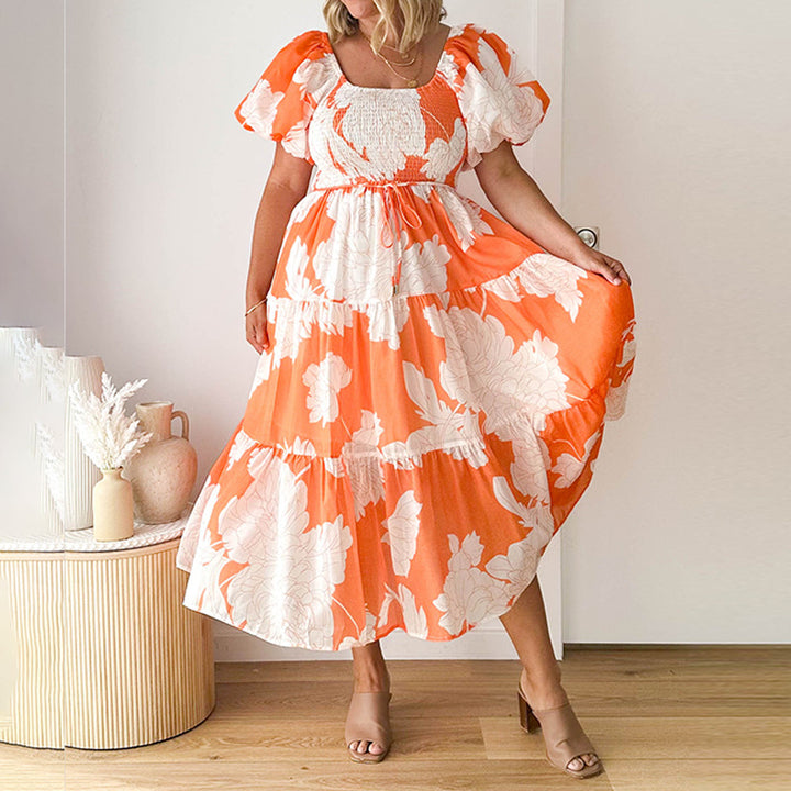 Robe Maxi pour femmes avec de volumineuses manches bouffantes et un design floral Chic & Stil