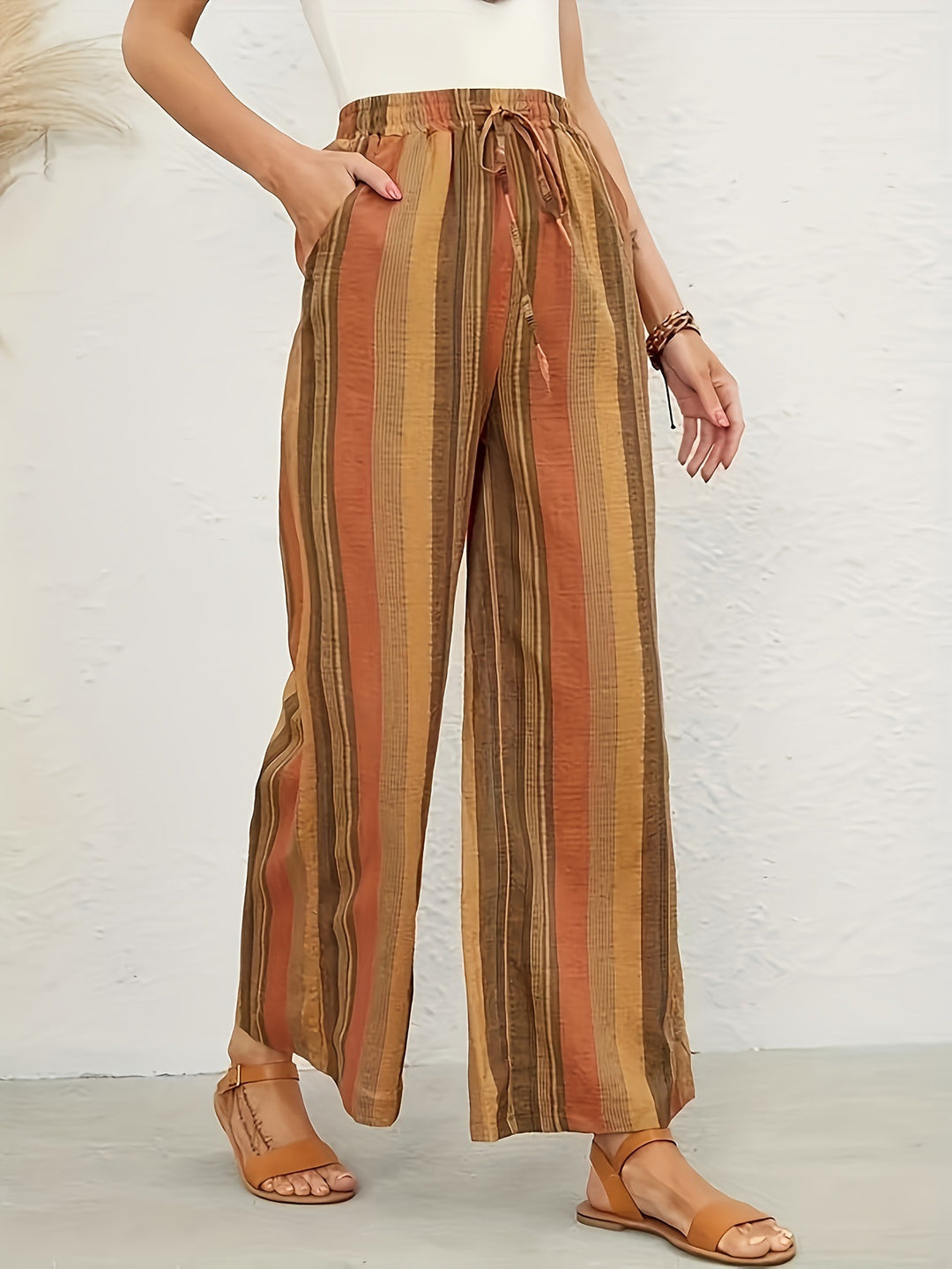 Wide striped pants for women with elastic waist and practical tie belt Lune London