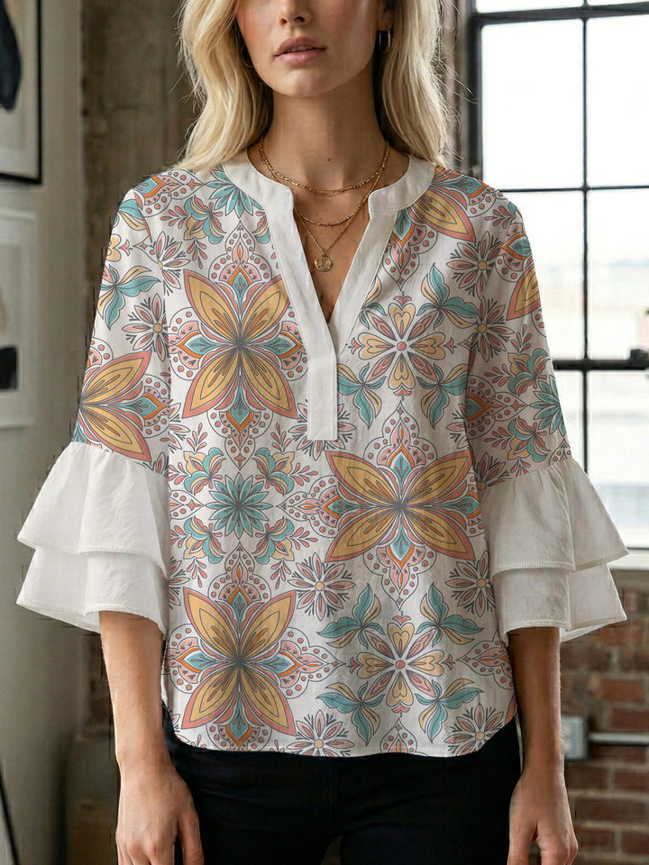 Women's blouse with voluminous ruffle sleeves and creative floral design Lune London